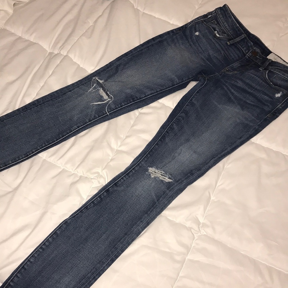 Distressed medium wash skinny jeans